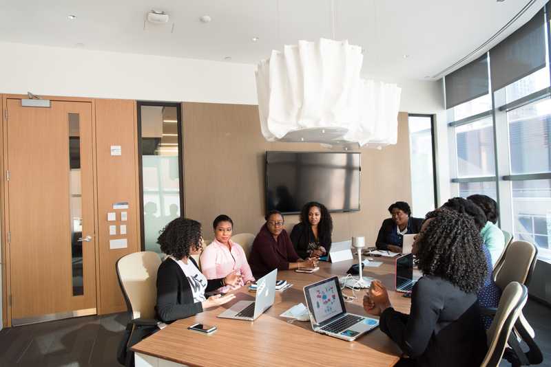 Africans in a work meeting around a conference table